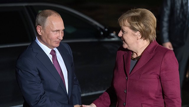 Путин прибыл в Берлин на переговоры с Меркель