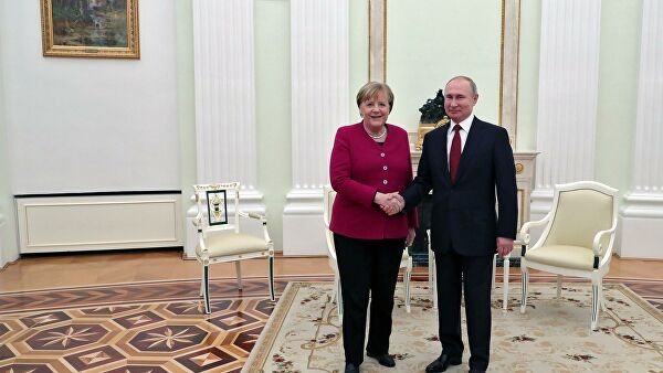 Путин назвал встречу с Меркель полезной и содержательной